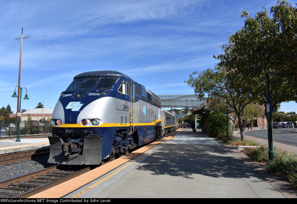 F59PHI # 2004 on the rear of Train # 716 as it pauses to receive passengers for the trip through the San Joaquin Valley 